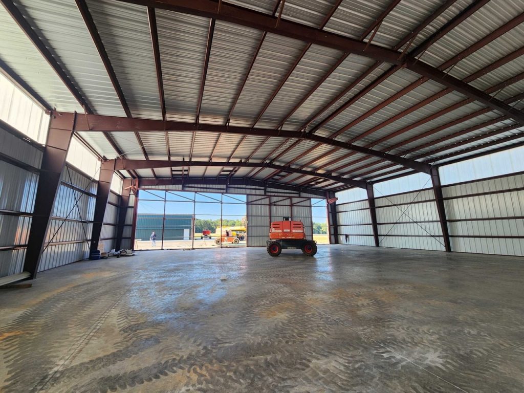 Inside of a steel airport hangar